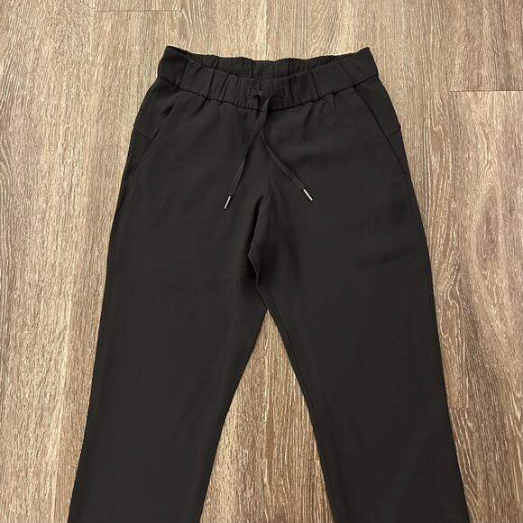 EUC Lululemon On the Fly 7/8 Pant Stretch High-Rise Black Sz 6 Minimalist Jogger - Picture 12 of 16